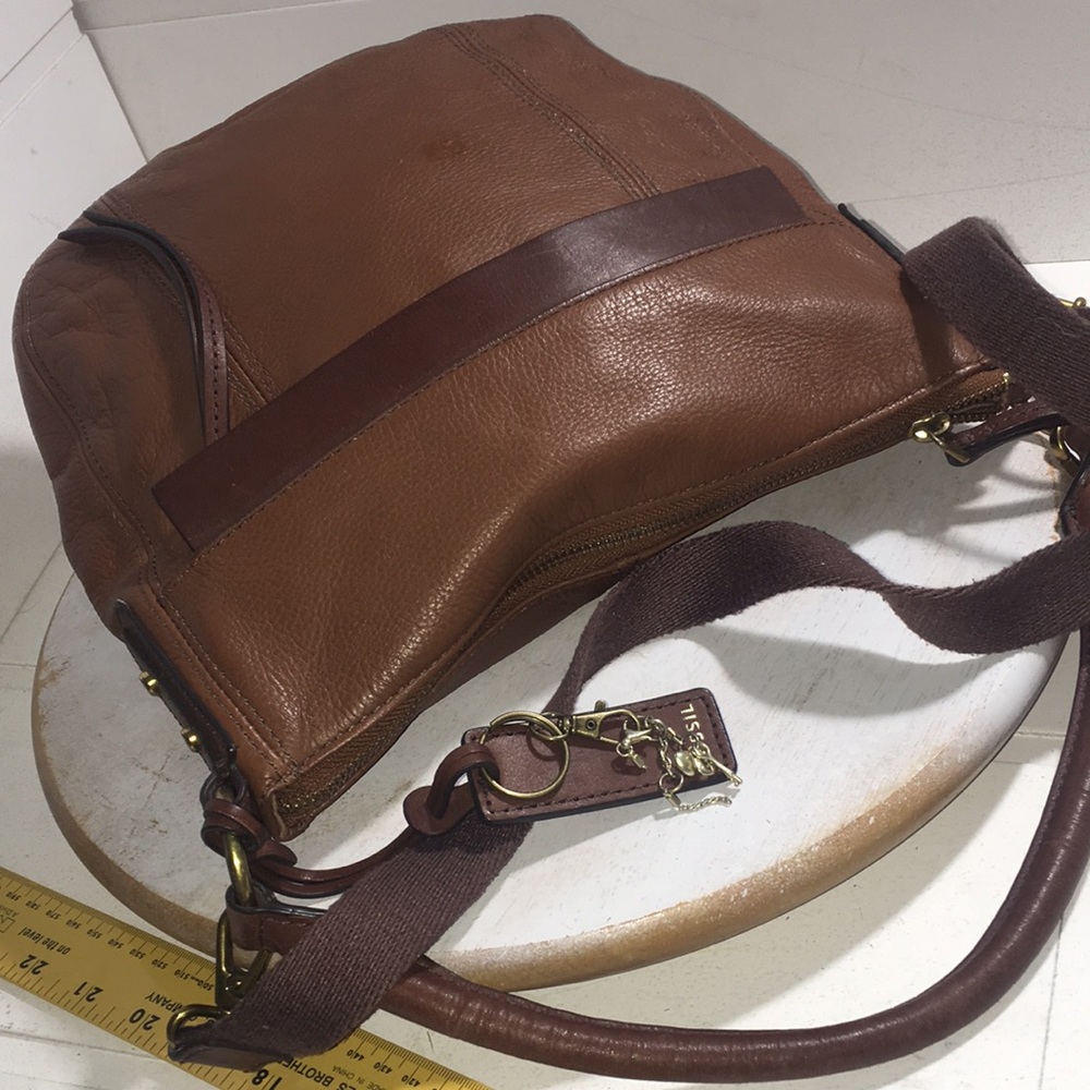 - Fossil dark wiskey color leather crossbody satchel bag.